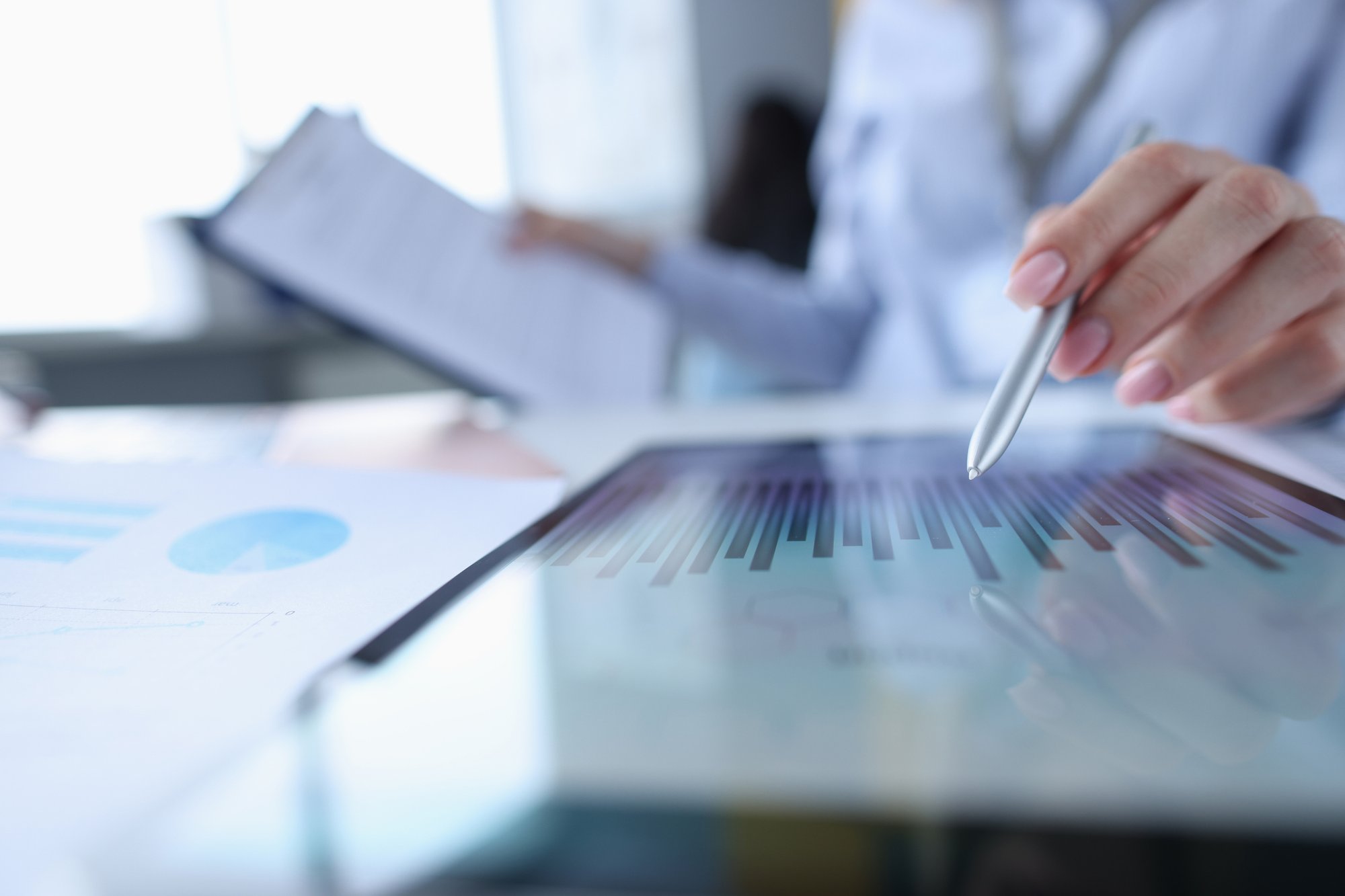 Business analysts reviewing data charts together