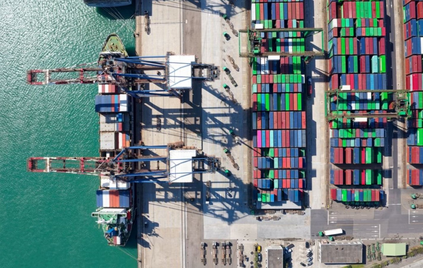 Aerial view of a container port, representing global trade and tariff exposure